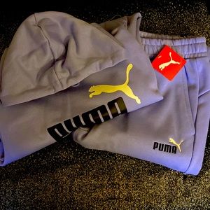 This is a size medium puma jogging jumpsuit in great condition never worn at all